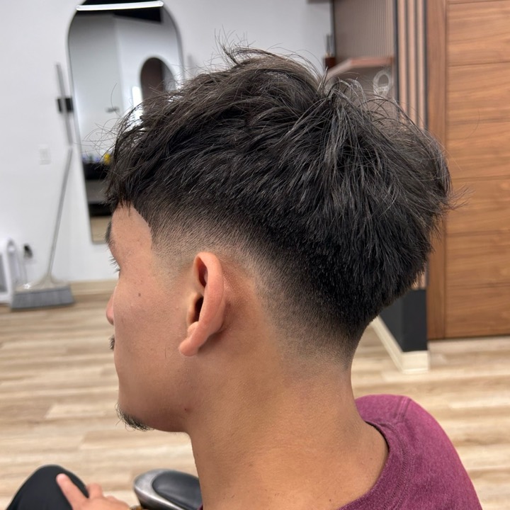 Textured crop with a clean taper